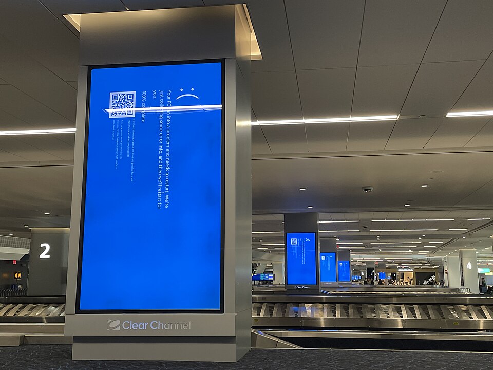 Blue screens of death on airport displays at LaGuardia Airport (LGA) on July 19, 2024, during the CrowdStrike Falcon sensor update outage that crashed 8.5 million Windows devices worldwide. Photo by Smishra1 / CC BY-SA 4.0